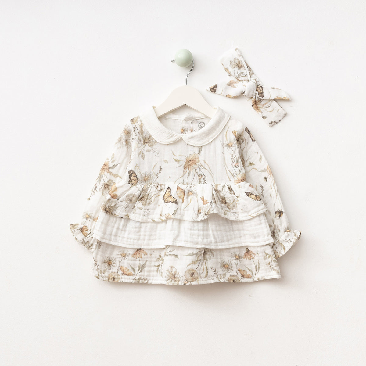 Butterfly Garden ruffle baby dress with matching bow, soft cotton outfit for girls.