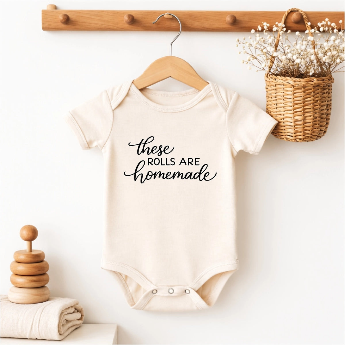 Funny “These Rolls Are Homemade” baby onesie