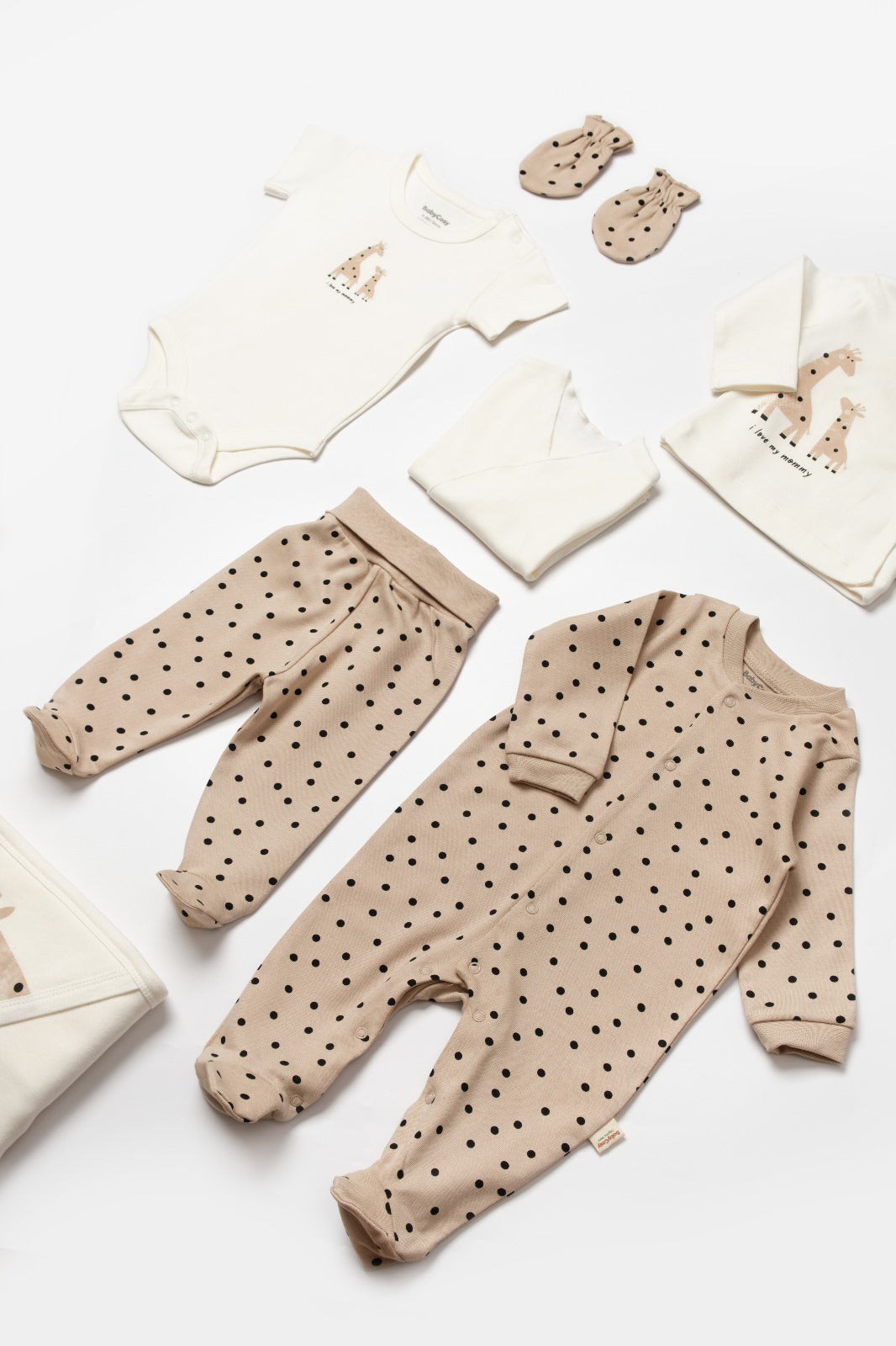 Neutral giraffe newborn outfit bundle including bodysuit and pants