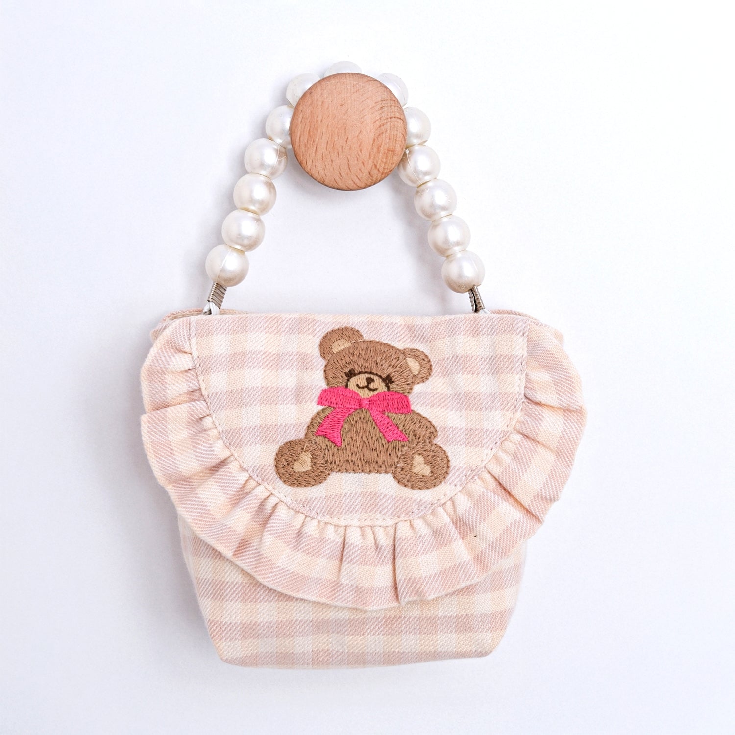 heirloom style baby girl dress in blush gingham fabric