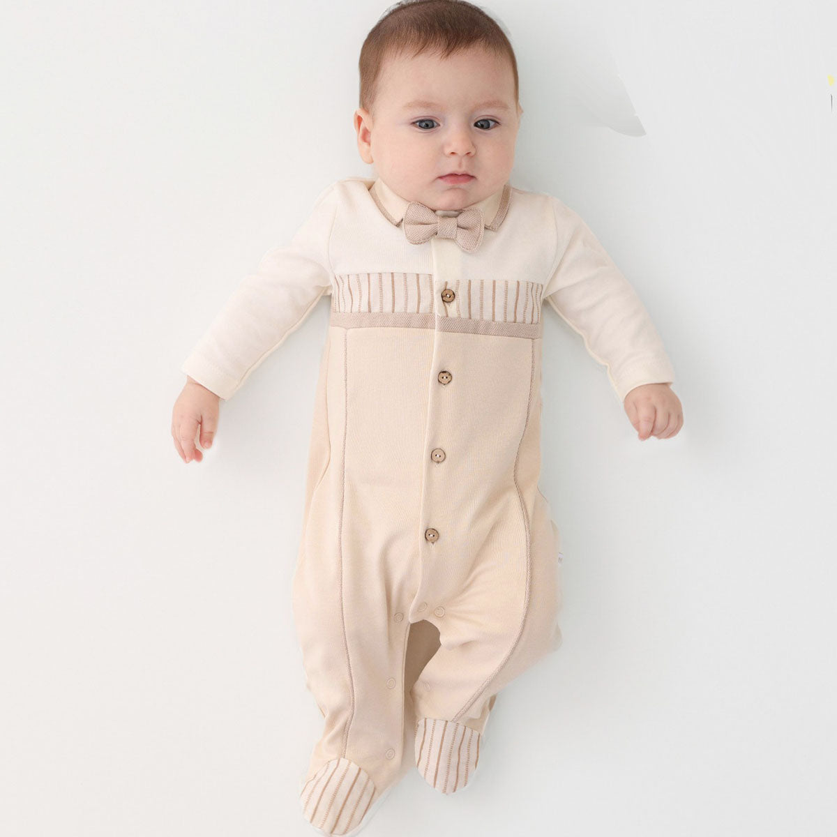 Levi footed baby romper, cozy organic cotton outfit perfect for newborn comfort and toddler wear.