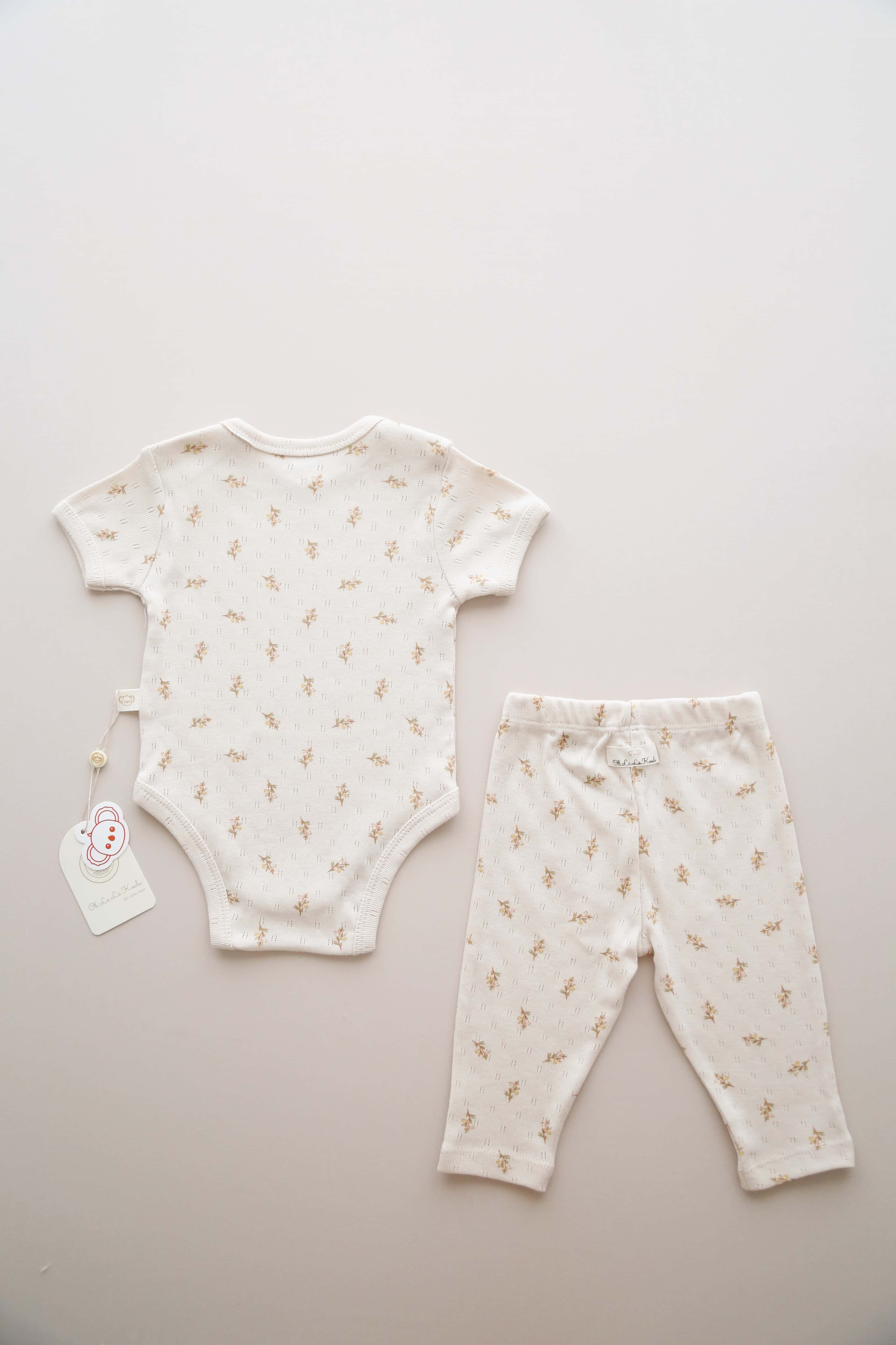 Organic cotton pear print 2 piece baby outfit, adorable unisex newborn clothing ideal for gifting.