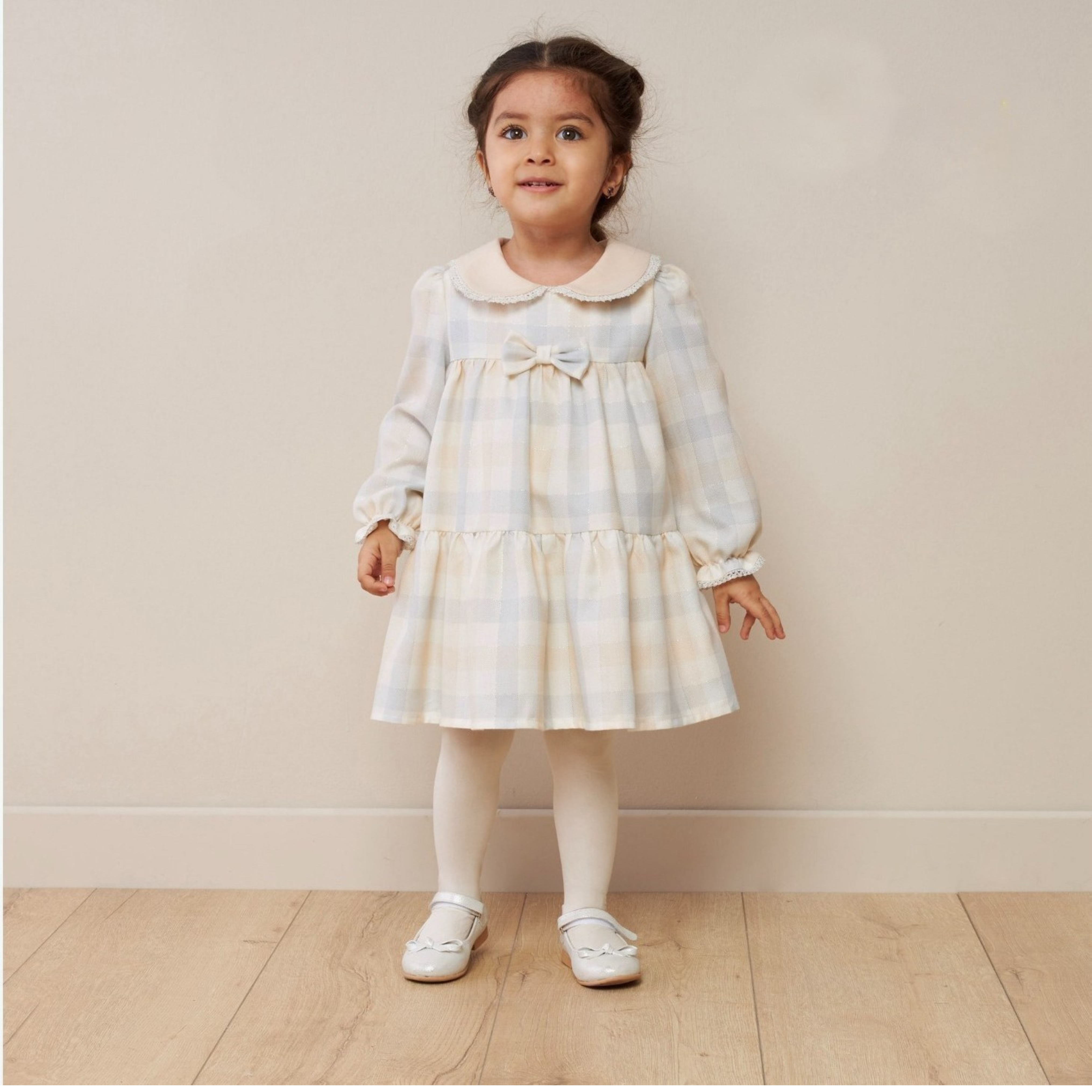 Elegant powder plaid bow dress for baby girls, classic cotton holiday outfit.